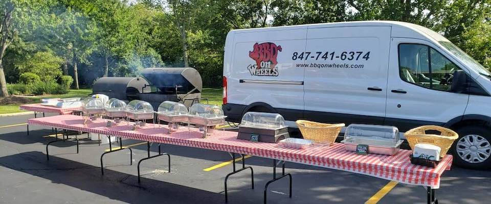 On-site BBQ catering, cooked and managed on site by BBQ on Wheels.